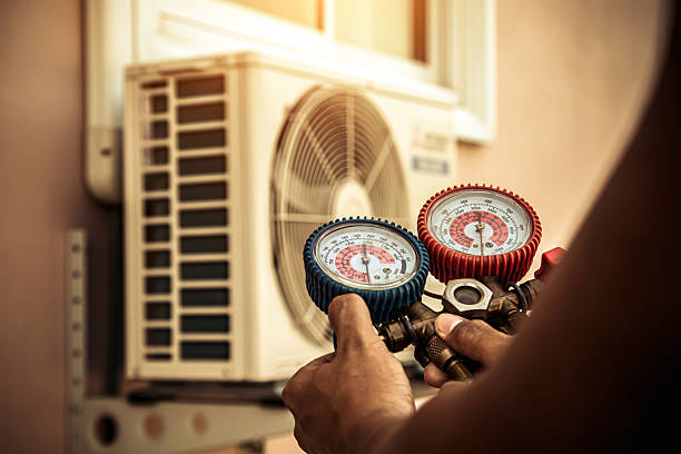 Professional Air Conditioning Service technician working in Middletown, VA